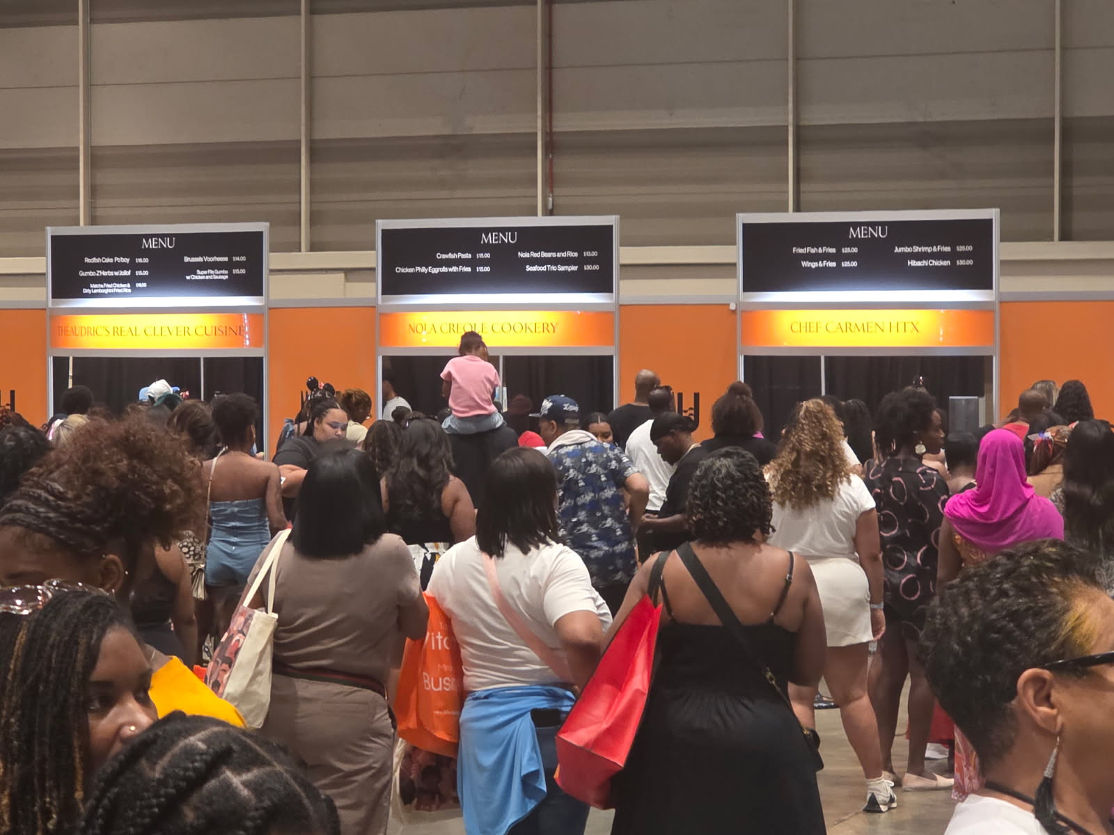 Local food vendor booths at Essence Festival in New Orleans