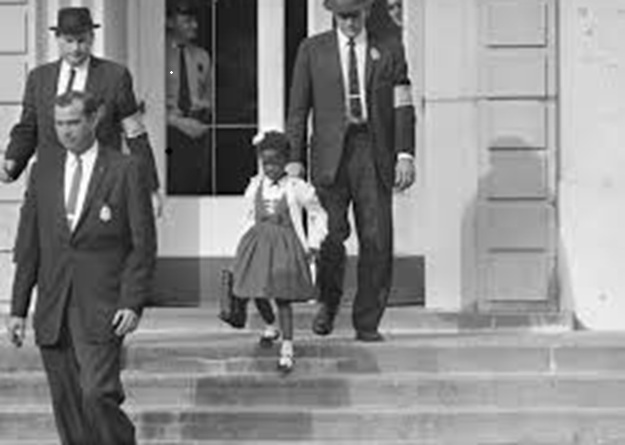 Ruby Bridges escorted by federal marshals into William Frantz Elementary School, New Orleans, 1960